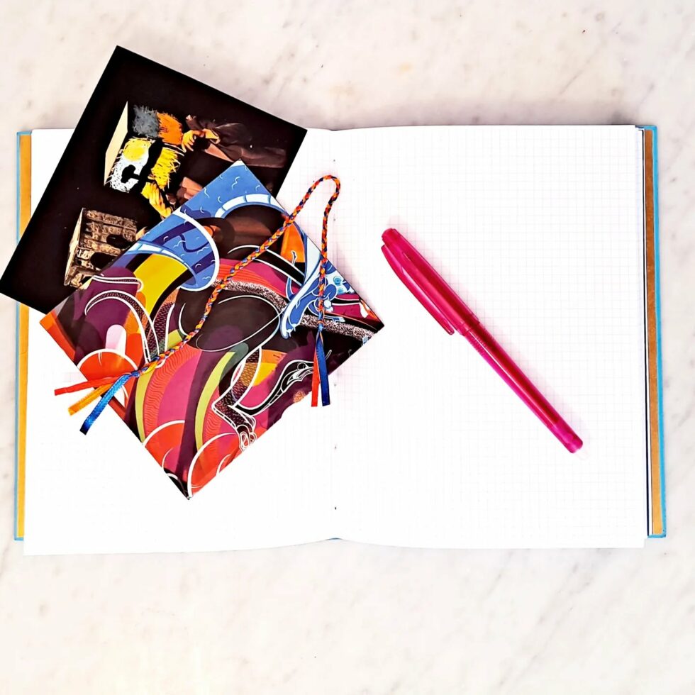 Carnet FARANDOLE, intérieur pages petits carreaux et stylo.