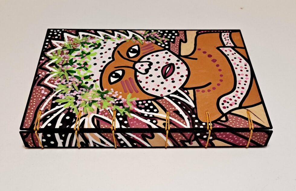 Carnet DABA avec vue arrière et reliure secrète belge.