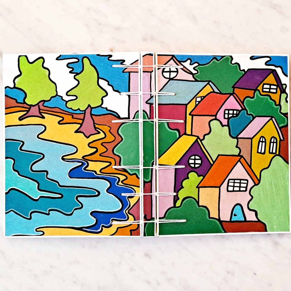 Carnet RIVAGE vue ouvert à plat sur table